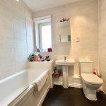 Modern bathroom with bathtub and toilet