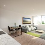 Modern open-plan kitchen and living room space.