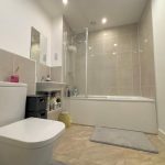 Modern bathroom with shower and toilet