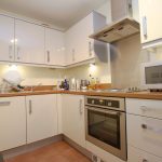 Modern kitchen with oven and microwave