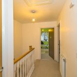 Bright hallway leading to a child's bedroom