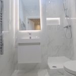 Modern bathroom with marble tiles and shower