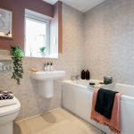 Modern bathroom with stylish decor and toiletries.