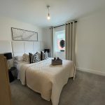 Modern double bedroom with neutral decor