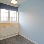 Small room with window and neutral colours