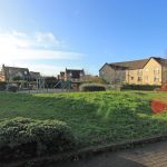 Residential park with playground and houses