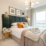 Modern bedroom with cosy bed and stylish decor.