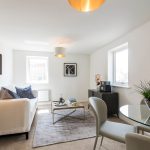 Modern living room with stylish furniture and decor.