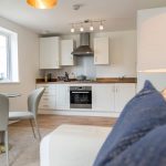 Modern kitchen and dining area with lighting