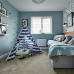 Cosy child's bedroom with play tent and toys.