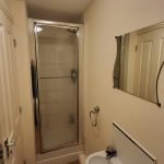 Small bathroom with shower and sink