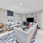 Modern living room with sofas and globe