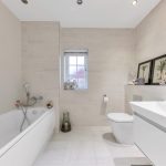 Modern bathroom with bathtub and sink