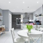 Modern kitchen with dining area.