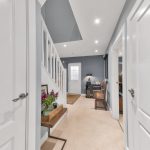 Modern hallway with flowers and seating area