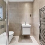 Modern bathroom with sink and towel radiator