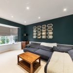 Stylish living room with modern decor and mirrors