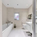 Modern bathroom with bathtub and shower