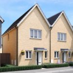 Modern semi-detached houses with clean brickwork.