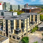 Modern urban buildings with surrounding greenery