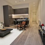 Modern open-plan living room and kitchen design.