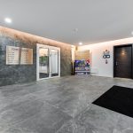 Tempus House lobby with floor directory sign.