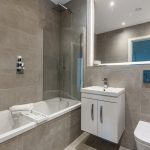 Modern bathroom with bathtub and sleek fixtures