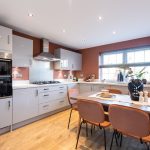 Modern kitchen with dining table and chairs