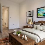 Modern bedroom with art and wooden furniture