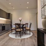 Modern kitchen with dining area.