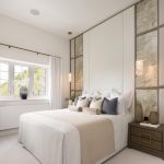 Modern bedroom with elegant decor and large window