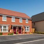 Modern semi-detached brick houses with driveway