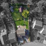 Aerial view of residential gardens and houses