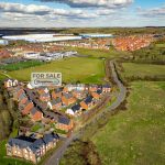 Aerial view of housing development for sale.