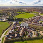 Aerial view of residential housing estate for sale.