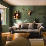 Cosy living room with sofa and decorative skull.