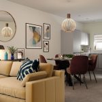 Modern open-plan living room with stylish decor.