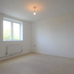 Empty room with carpet and window view