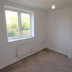 Empty room with window and light bulb