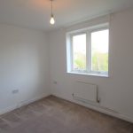 Empty room with window and light bulb.