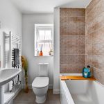 Modern bathroom with patterned tile walls