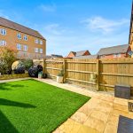 Modern garden with lawn and patio