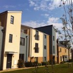 Modern housing estate under clear sky