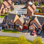 Aerial view of suburban houses for sale.
