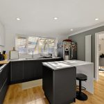 Modern kitchen with dining room view.