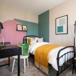 Cosy bedroom with stylish decor and modern accents.