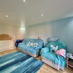 Cosy living room with blue decor and sofa.