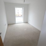 Empty room with window and door, minimalist design