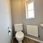 Small bathroom with toilet and sink