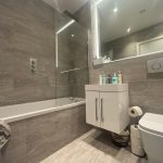 Modern bathroom with bathtub and sink